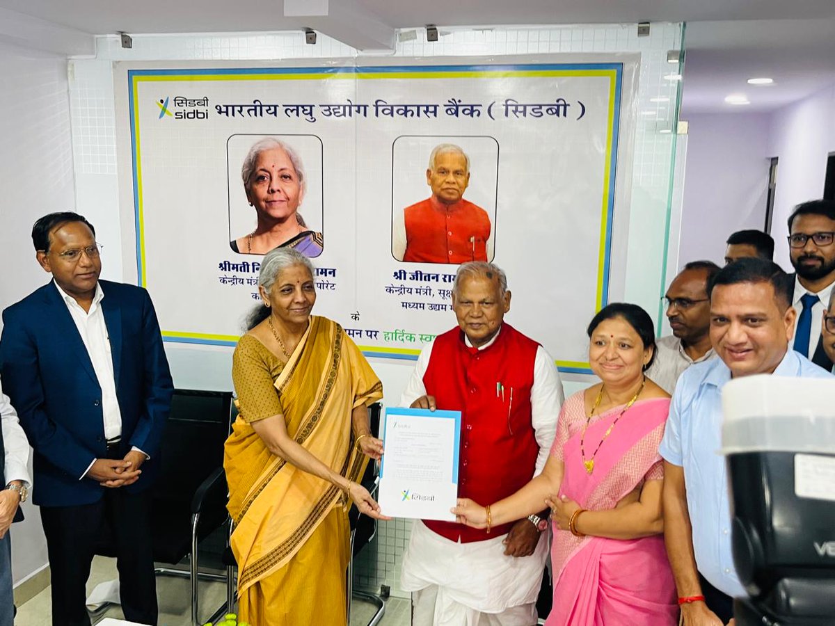 Hon'ble <a href="/nsitharaman/">Nirmala Sitharaman</a> and Hon'ble <a href="/jeetanrammanjhi/">Jeetan Ram Manjhi</a>, handed over the loan sanction letters, in the presence of Shri M Nagaraju, Secretary, <a href="/DFS_India/">DFS</a> to borrowers during their visit to SIDBI branch office in Udaipur, Rajasthan.