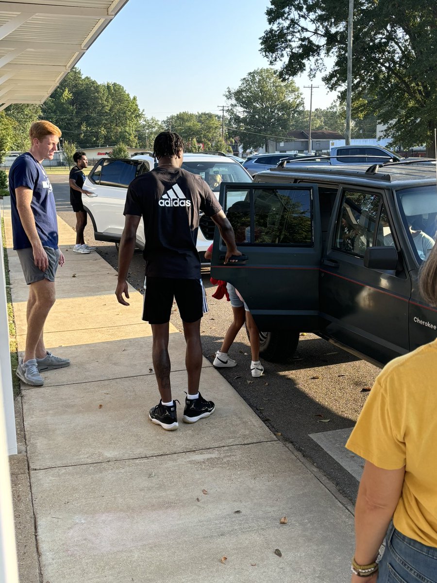 A GOOD MORNING! The W  men’s basketball greeted children at Annunciation School this morning with some encouragement to start their day!