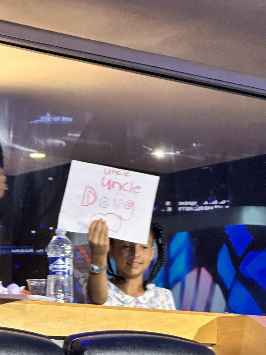RachelRoberts's tweet photo. These amazing girls (Kamala’s great nieces) were in the suite directly behind our seats. I asked them and their dad if I could get a photo with their handmade signs, that they kept making for each speaker, and they kindly obliged. For me, they stole the whole show.  
#,la https://t.co/GMh1tgYSc1