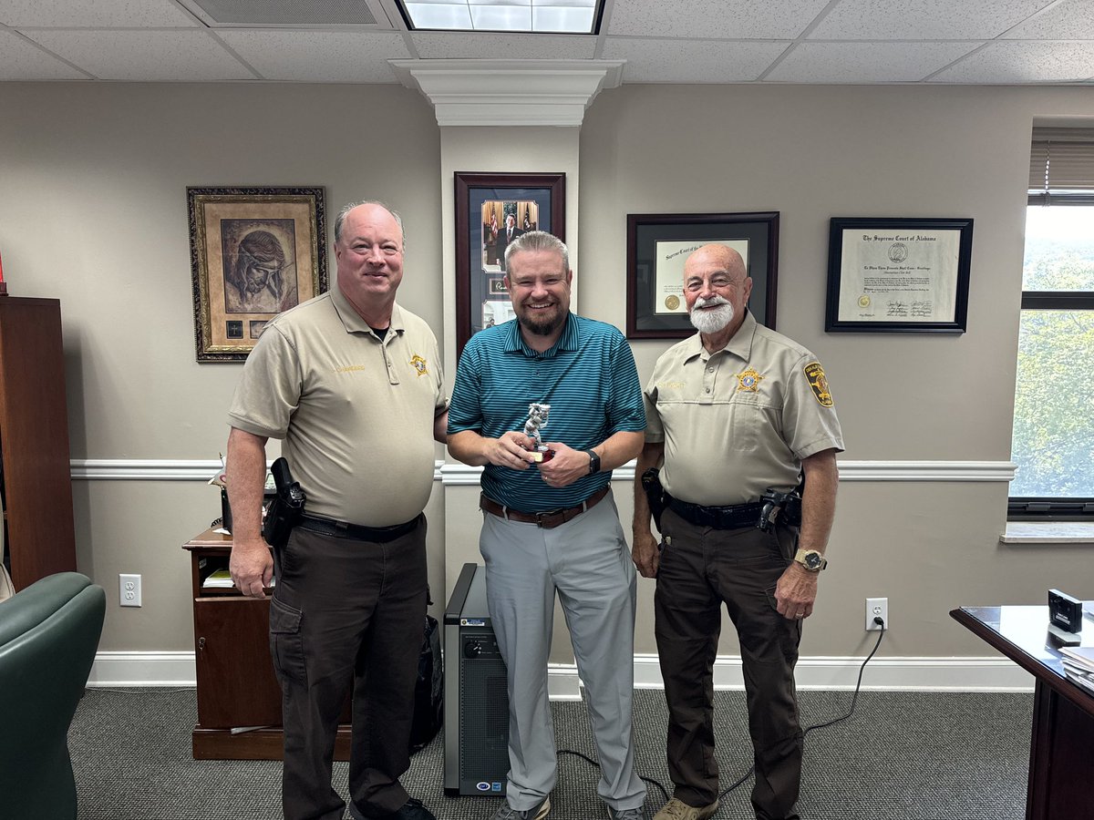 Deputies Jim Chambers and Clay Fugatt happily delivered the trophy my team earned at this year’s F.O.P. Golf Tournament.  I was the number one contributor to this trophy.  Without me, the team would have definitely finished higher in the standings.  #mydekalb #golf