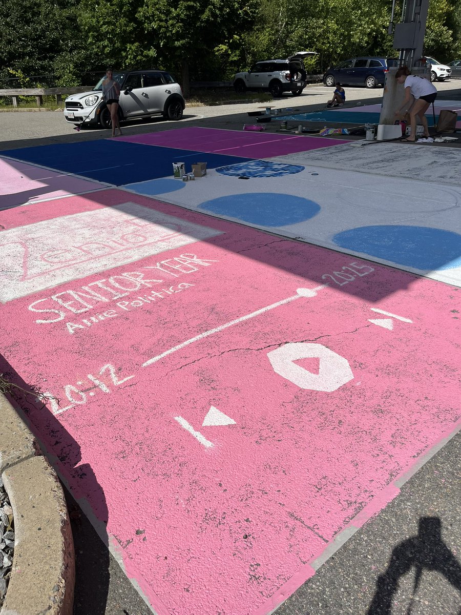 Class of 2025 working hard decorating their parking spaces