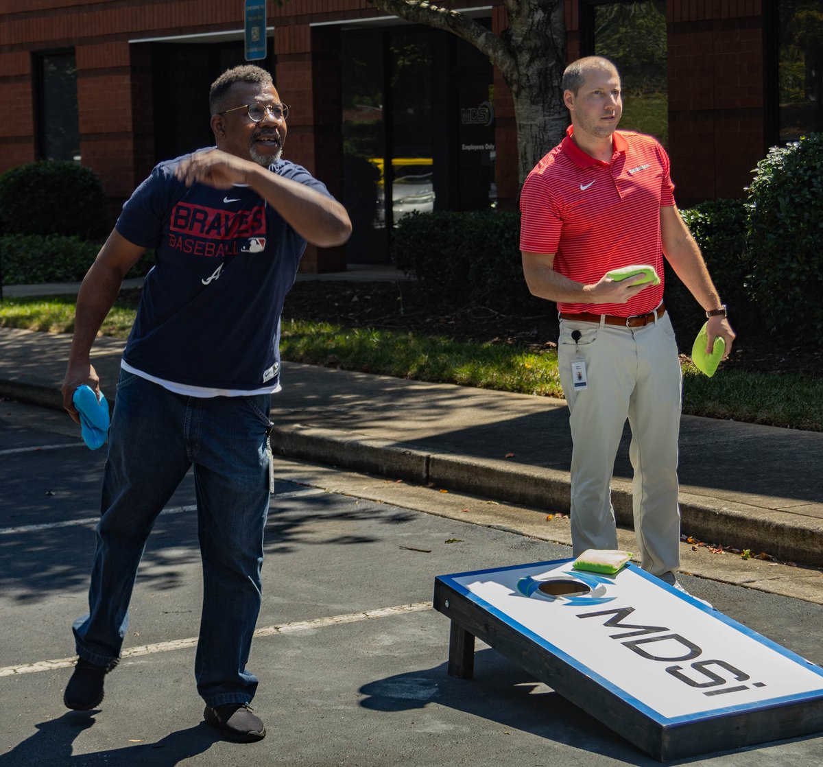 MDSi_inc's tweet photo. Football season is here and we couldn't be happier. Our annual kickoff party was a good time, with a little cornhole competition, some amateur axe throwing (HR only let use use plastic axes, but whatever 🙄), and a lot of delicious food from City Barbecue. #GooooTeam! #FiredUp https://t.co/al22TbbcsV
