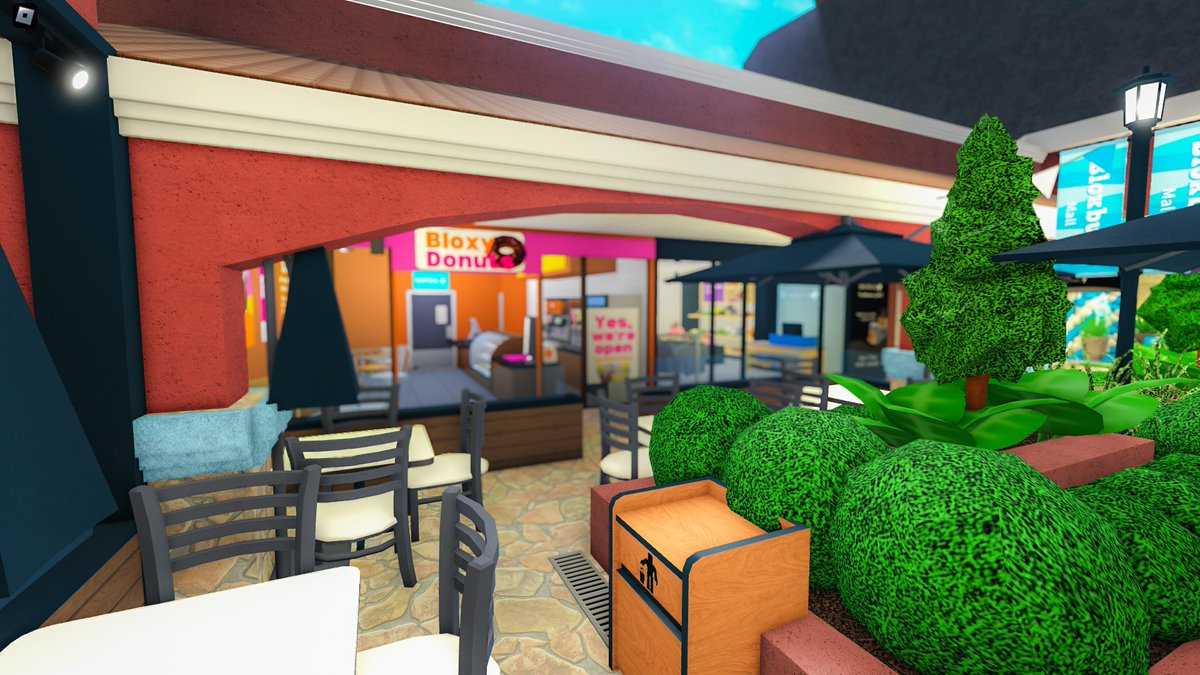 realrenoche's tweet photo. Designed to blend seamlessly with the Bloxburg aesthetic, this mall follows the same building structure, design, and vibes as the rest of the map, making it feel like a natural part of the town, located at Riverside Estates. https://t.co/mYLNnIkEBv