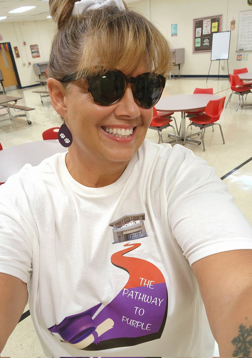 BZ13168's tweet photo. Rocking my new spirit days attire. Thursday was school colors day and today was "Pathway to Purple" day. Our Panthers are future Bearcats!  ❤️🖤💜🤍🏈🐾 https://t.co/aoNhmqAwVb