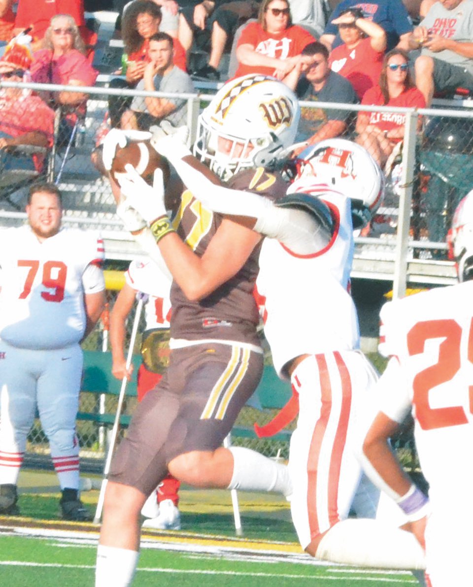 brown_press's tweet image. Touchdown catch by Brayden Harmon from quarterback Brady Sutton with two seconds to go gives Western Brown the 42-39 victory over Hillsboro in week one of high school football! Pictured is Harmon with a reception during the week one victory. Photo by Wade Linville