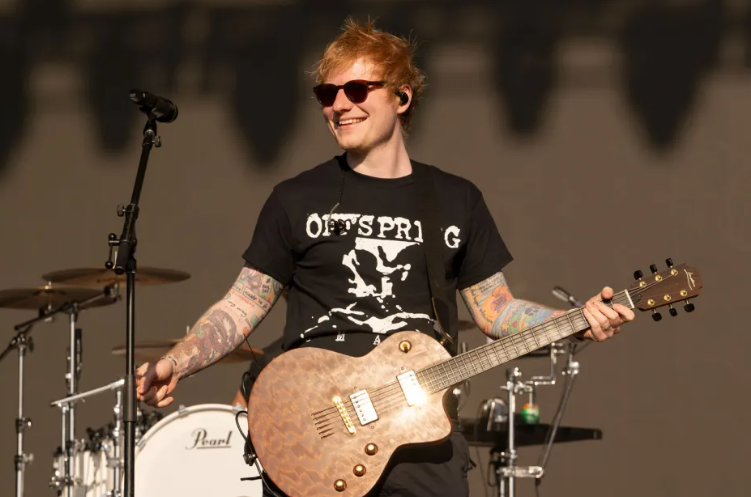 LovingGuiM's tweet photo. Ed Sheeran Joins Niall Horan Onstage in Dublin for Surprise ‘Little Things’ & ‘Lego House’ Duets

At a recent concert in Dublin, Niall Horan delighted fans with a nostalgic surprise: Ed Sheeran joined him on stage to perform acoustic renditions of "Little Things," originally penned by Sheeran for One Direction in 2012, and Sheeran’s own 2011 hit "Lego House." Harmonizing together, they recreated the heartfelt melodies that once graced the Billboard Hot 100 charts, evoking memories of both artists' early successes. The collaboration, captured in fan-recorded clips, showcased their mutual musical camaraderie, drawing cheers from the audience at Royal Hospital Kilmainham.

Niall Horan, currently on tour in support of his 2023 album "The Show," has been touring globally since February, with upcoming stops across Europe, Asia, North America, and Latin America, culminating in October. Meanwhile, Ed Sheeran, also touring Europe, continues to enjoy success with recent album releases that have charted prominently on the Billboard 200. Their joint performance in Dublin underscored the enduring appeal of their music and left fans eagerly anticipating more surprises on their respective tours.