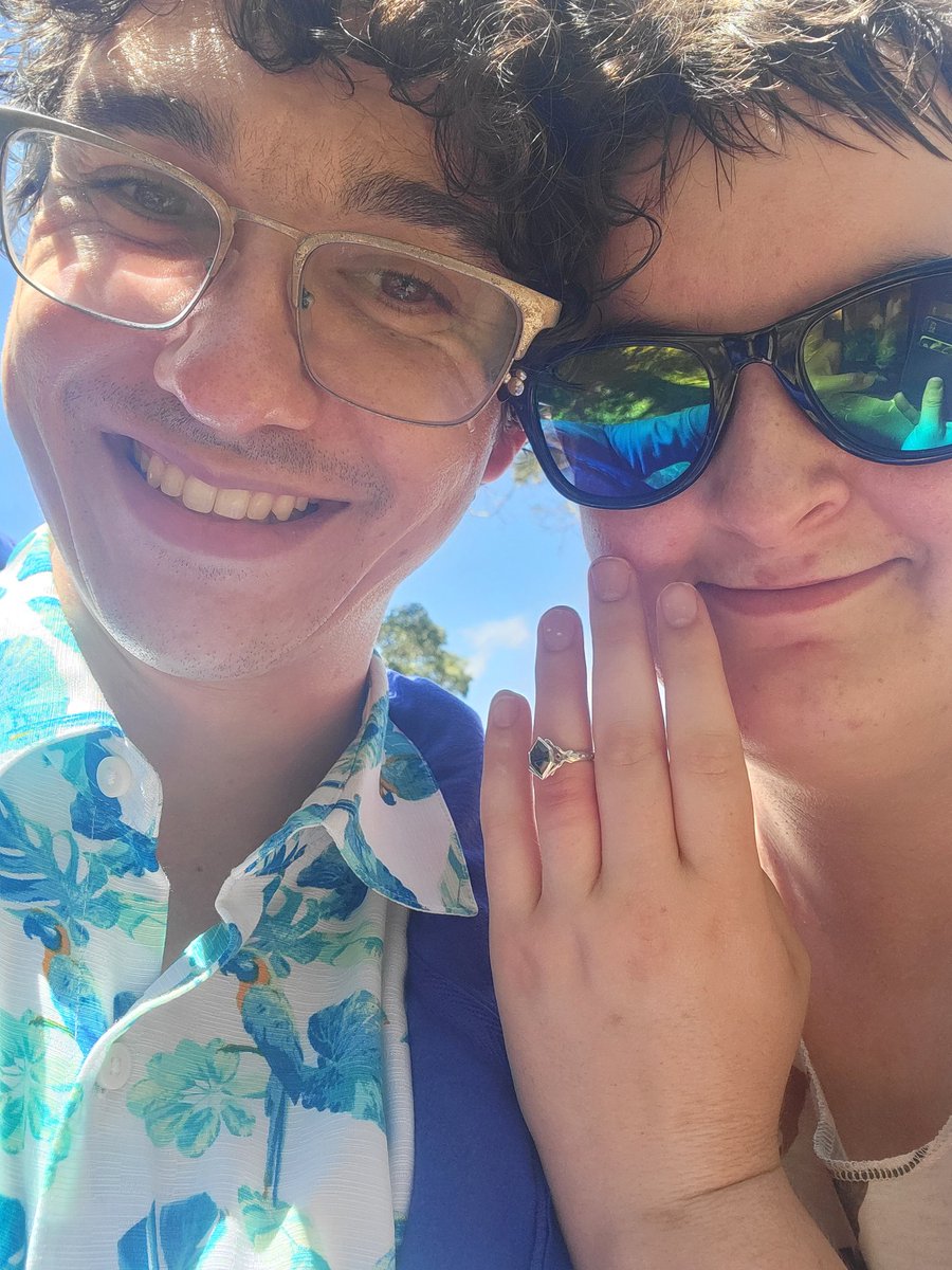 Azurenus's tweet photo. Came to Hawaii for @Pokemon Worlds, leaving engaged to the love of my life that I traveled all across N. America with for regionals. Points if you can guess what Pokemon the ring is based on. https://t.co/1HVPVo08i0