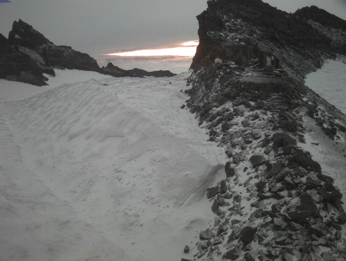 A dusting of summer snow at 10,000 feet on Rainier this morning. #wawx