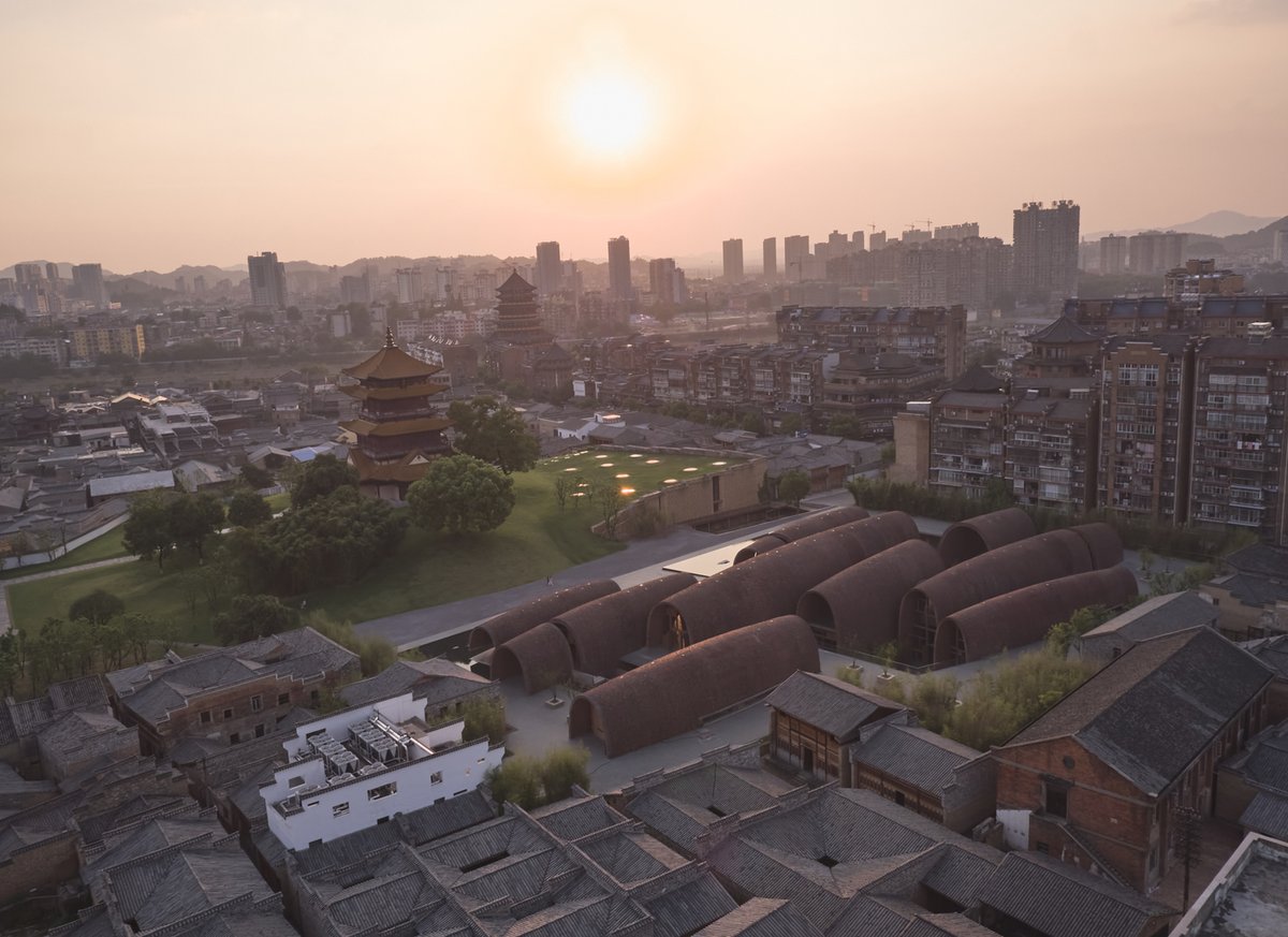 w_emerg's tweet photo. What does it mean to build a museum that not only preserves history but also blends seamlessly into it?
The Imperial Kiln Museum in Jingdezhen, located near the ancient kiln ruins, is a testament to this challenge.
#ArchitecturalHeritage #JingdezhenMuseum #PorcelainCapital https://t.co/ZfuwTtqkXC