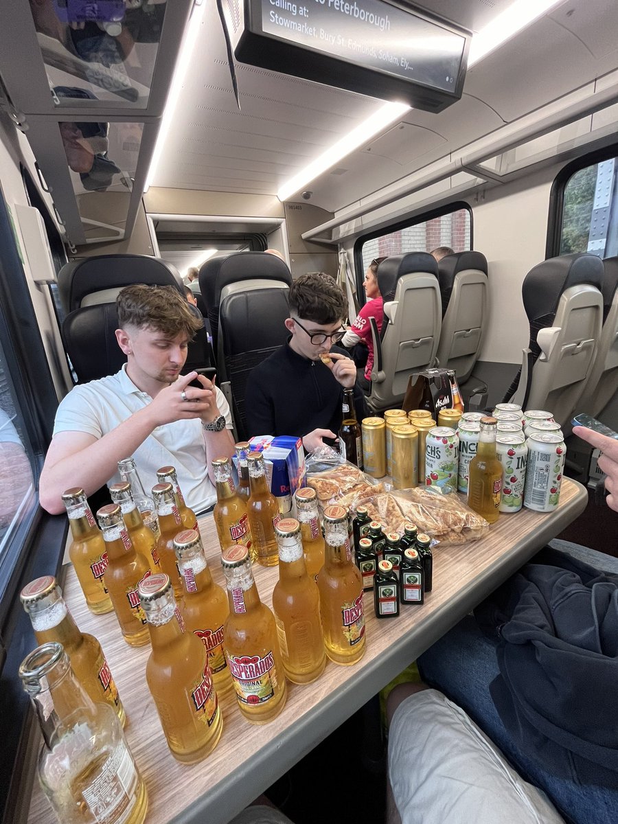 Footballtweet's tweet photo. 🚜 Ipswich fans on their way to the Etihad earlier this morning. 👏 

Fair to say they plan on blacking out so they don’t remember the game… 🍺🤣

📸 @itfc_louis2 https://t.co/cbc6m6N2fs