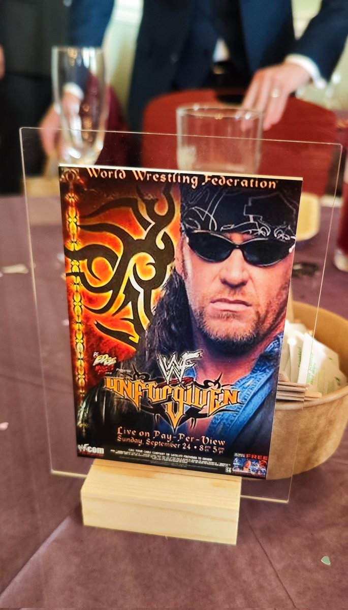 RhystleMania's tweet photo. At a friend's wedding and all the tables are named after 2001 WWF PPVs. Incredible! https://t.co/m4qsLB4Rdm
