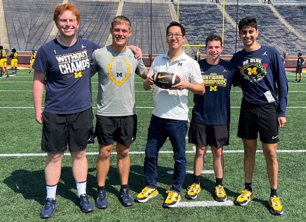 SantaJOno's tweet photo. I’m very grateful for the student managers at University of Michigan, like Eric, Kane, Spencer and Cyrus in this photo for all that they do to help run UM football. Thanks for playing catch with me as well! https://t.co/0HNGLa4Ee0