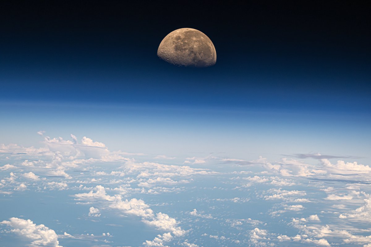 The moon setting over the Pacific. 

Went to the cupola to shoot Tropical Storm Hone near Hawaii but right after we passed by the storm the moon started to set.

400mm, ISO 500, 1/20000s shutter speed, f2.8, cropped, denoised.