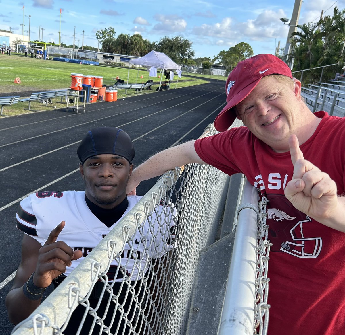The Super Fan <a href="/CanaanSandy/">canaan sandy</a> future Razorback tour is at <a href="/PBCbroncosFBALL/">PBC Football</a> to watch WR commitment <a href="/6goneslide/">Kamare Williams</a> &amp; the Broncos  vs Spanish River.  Kamare made sure to greet the ESPN Hall of Famer before the game.