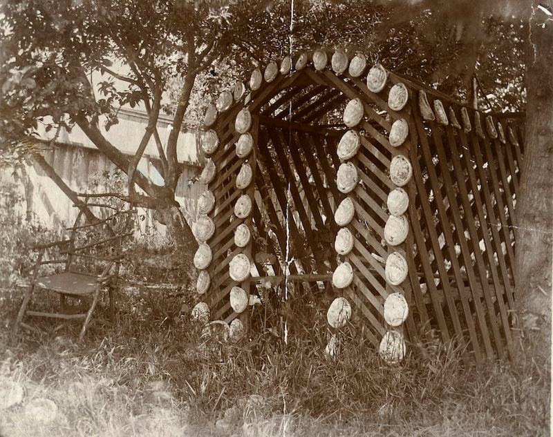 Kelley House Lattice Arbor with Abalone Shells. Undated photo of a wooden arbor with decorative abalone shells in the Kelley House yard. This small arbor was located next to the Kelley House water tower. A handmade chair made from sticks sits empty to...

kelleyhousemuseum.org/kelley-house-a…