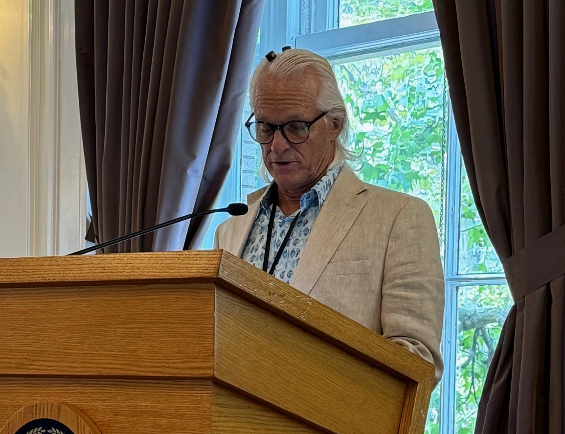 Scott Imbrie, who has two implants in the motor regions of his cerebral cortex, gives a tribute to Sliman Bensmaia at #SimCo24.