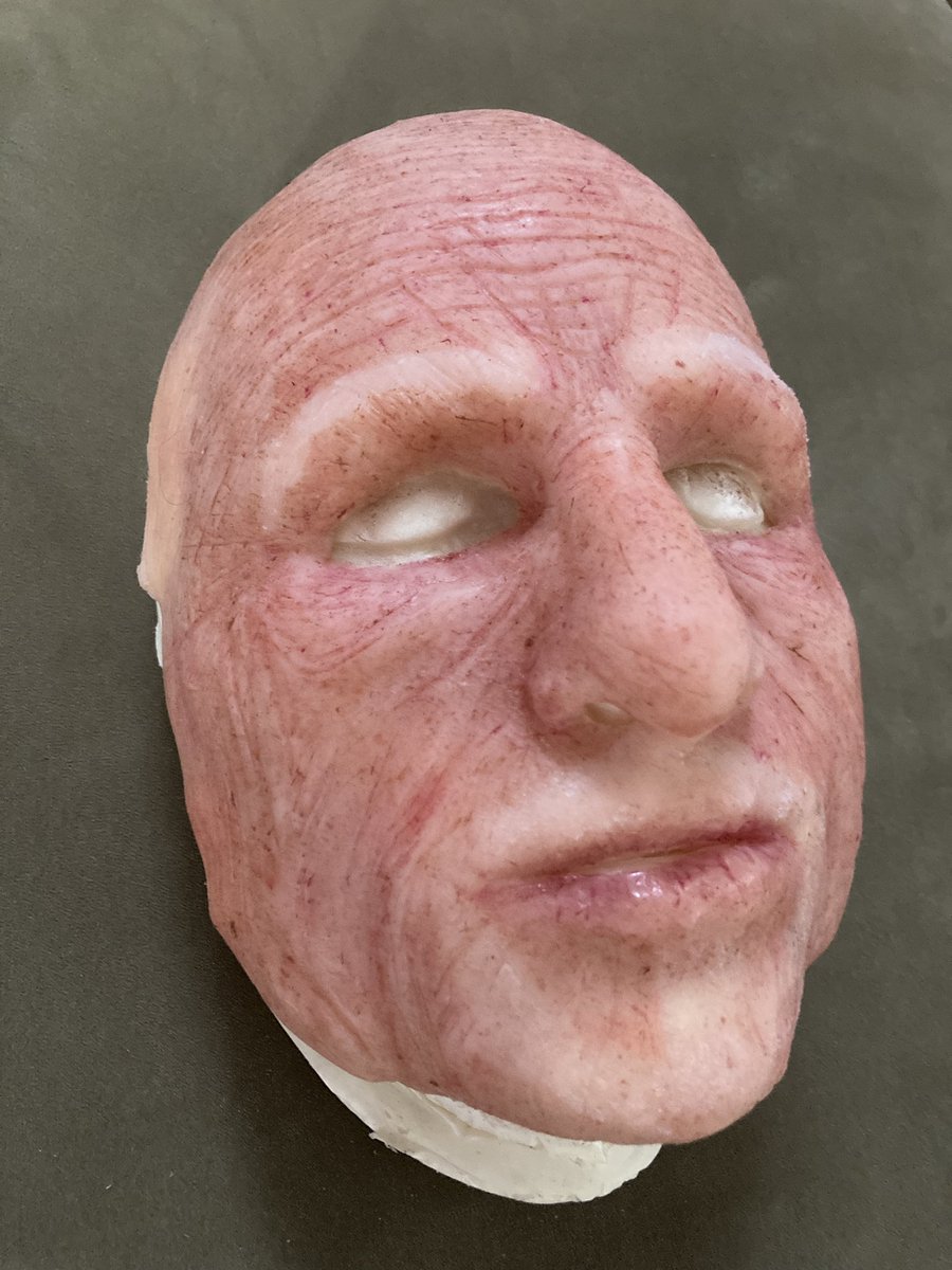 DuskySamCat's tweet image. My most recent Sy Smoothie is getting a revision. The Velcro straps were removed along with the facial hair and the eyeholes and mouth were cleaned up. The intention is to glue this to a spandex hood, add silicone ears (already ordered) and new facial hair. He’ll still be a fake!