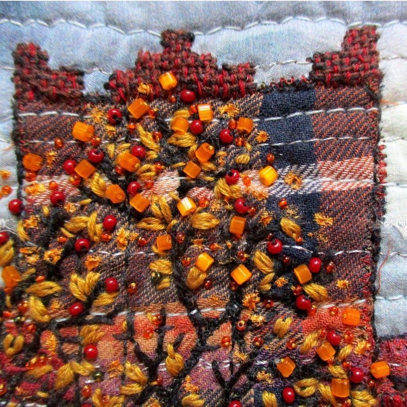 Experience the charm of autumn within the walls of an old factory through intricate embroidery art in a compact size. Discover more at the link buff.ly/3YE7OfK   #AutumnArt #Embroidery