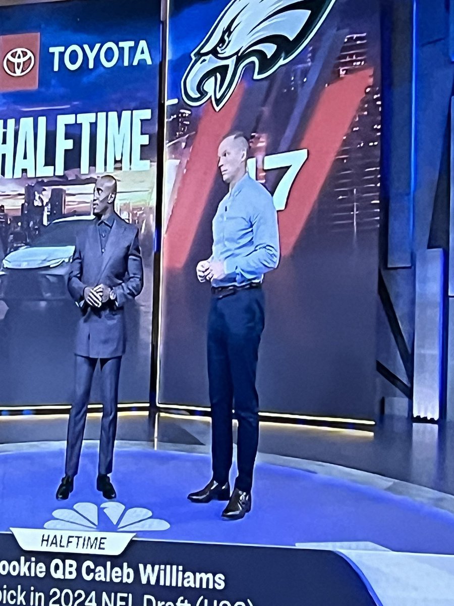 Chris Simms is dressed like he’s gonna crawl through a river of shit and come out clean on the other side