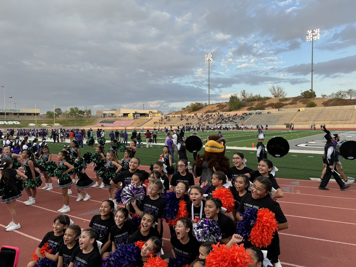 ESerna_PK8's tweet photo. Mission Ridge Cheer Team cheering for our Falcons during @Eastlake_HS Homecoming football game!! Hoot! Hoot! Hoot! for our Falcons!! 🧡🦉💜 #TeamSISD #ALLIN #ALLINforOURmission @CMartinez_MRE @__CGarcia https://t.co/V6pEMGiF7G