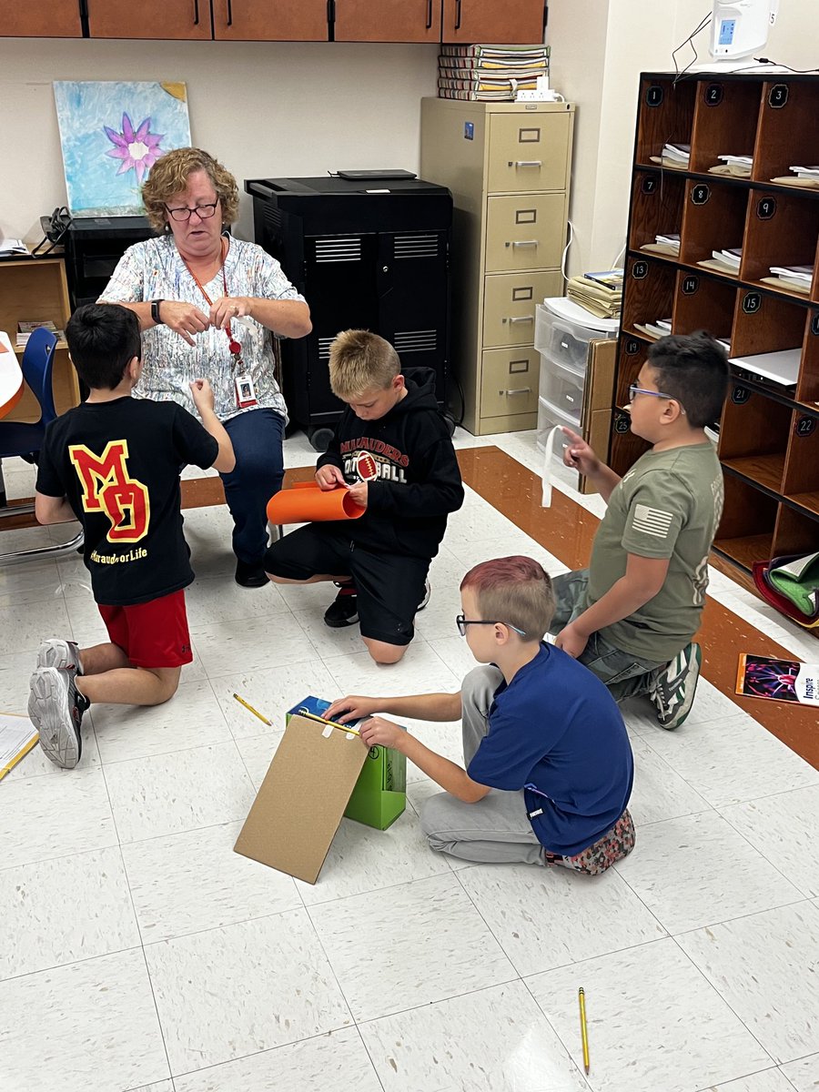 CmsJuckett's tweet photo. Students worked together to see what would happen when a marble was rolled on the open floor vs a curved track. ⁦@CMSmtolive⁩ ⁦@NicoleMusarra⁩ ⁦@ashleylopez210⁩ https://t.co/H7de1rmttq