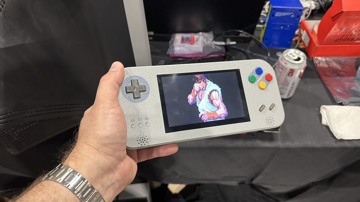 whatskenmaking's tweet image. If anyone wants to try out the #misterfpga portable, I’m over at @benheck’s table. Brought a good selection of #tapto cards, and the PicoZX loaded up with C64 as well #vcfmw