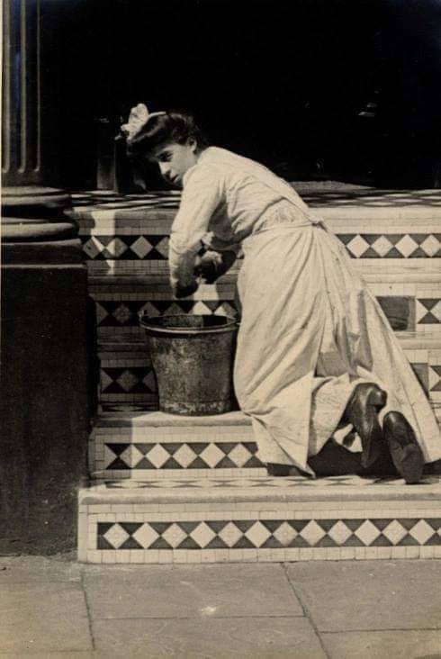 A maid cleans her employers steps
Cheniston Gardens
Kensington
29th July 1906
Photo by Edward Linley Sambourne