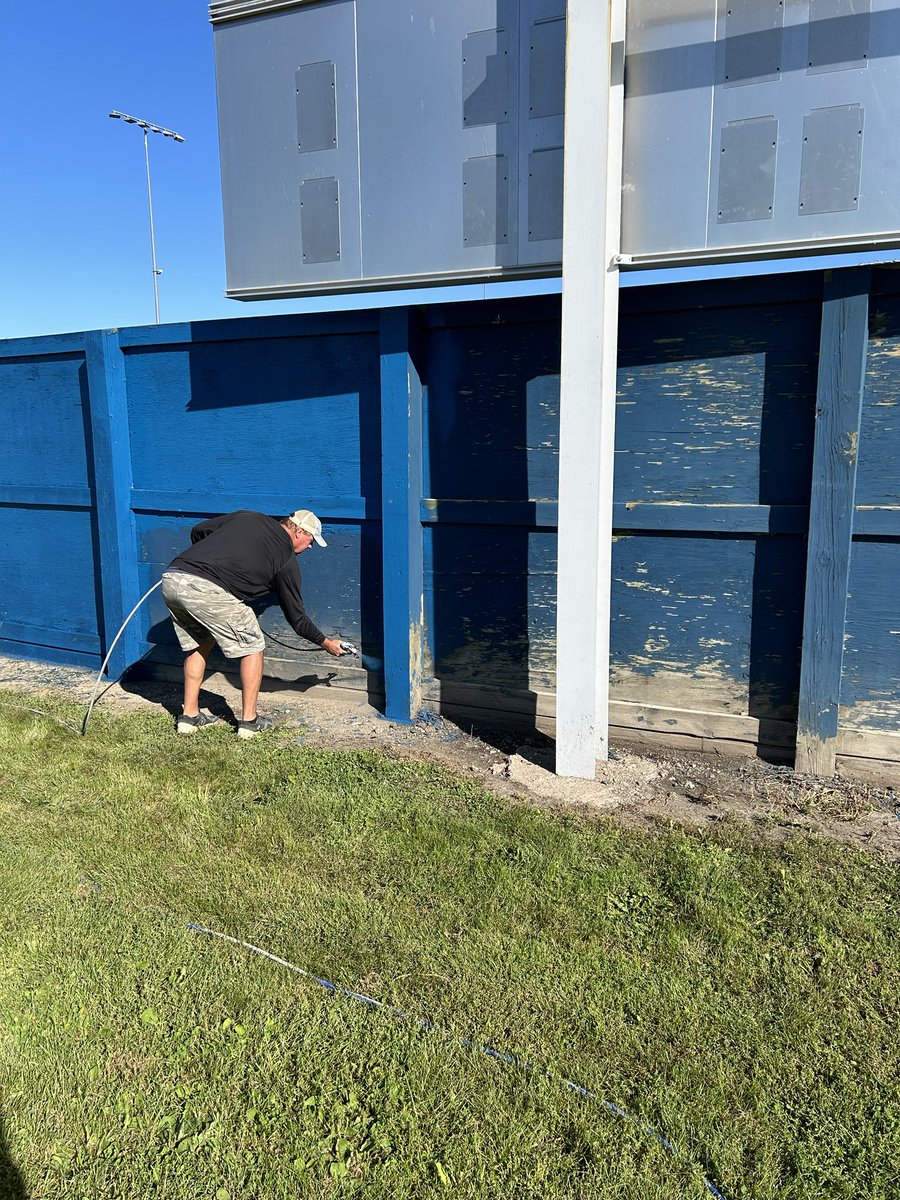 What does your manager do after 5 straight weekends of baseball and 6 days after winning a State Championship?  Our guy, Freddy, paints the fence at the ballpark!!  He’s the best!!