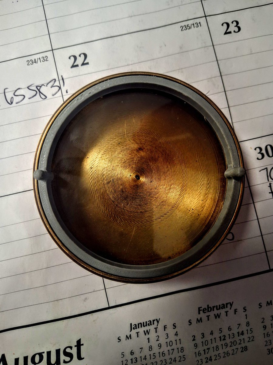 programmer1200's tweet image. Found a broken compass and tore out all the parts leaving a brass case and I thought it would make a interesting terrarium for some moss cuttings, so I designed a seal to hold in the glass and a small layer of leca and a piece of mesh for the moss to grow on. Find out in 3 months