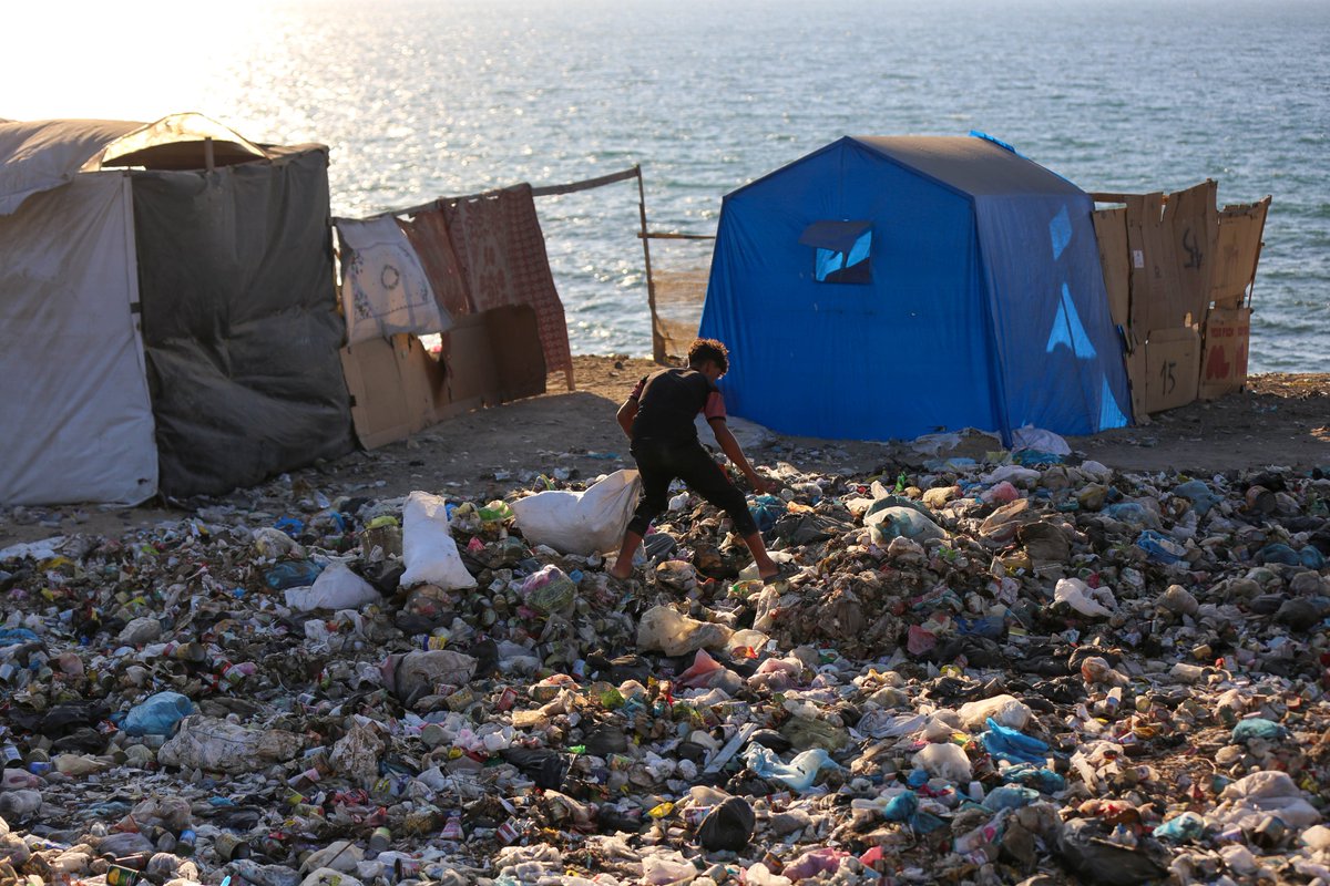 UNRWA's tweet image. While we vaccinate children against #polio, many other diseases continue spreading in #Gaza

Piles of trash grow higher next to tents &amp;amp; shelters. Sewage keeps flooding the streets. Access to hygiene products is increasingly limited. Sanitary conditions are inhumane. #CeasefireNow