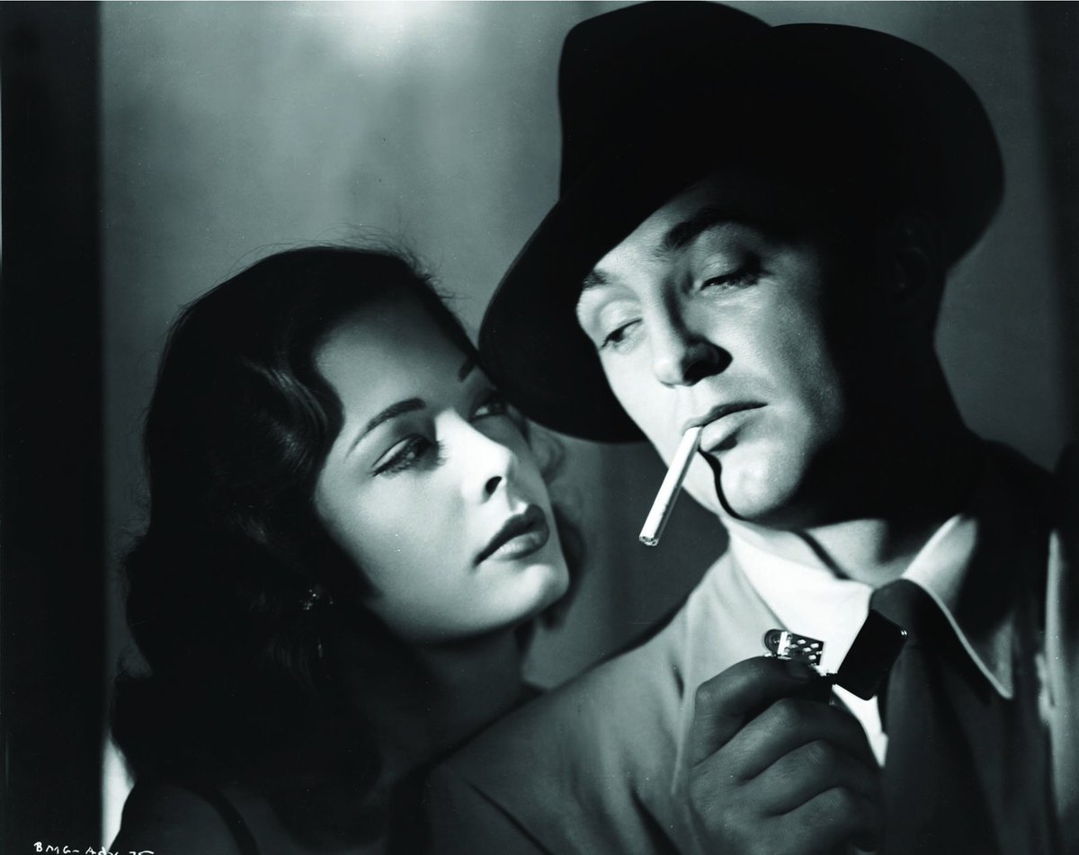CTMillion's tweet photo. #NoirChecklist for #OutOfThePast:
-Flashback/narration/past catching up
-Good girl vs. bad girl
-Larceny, murder, blackmail, oh my!
-Ace noir lensman Nick Musuraca
-More exotic locales than the Love Boat
-Greer in that dress, Mitchum in that trenchcoat!
#TCMParty #NoirAlley https://t.co/6fzJHNwWlg