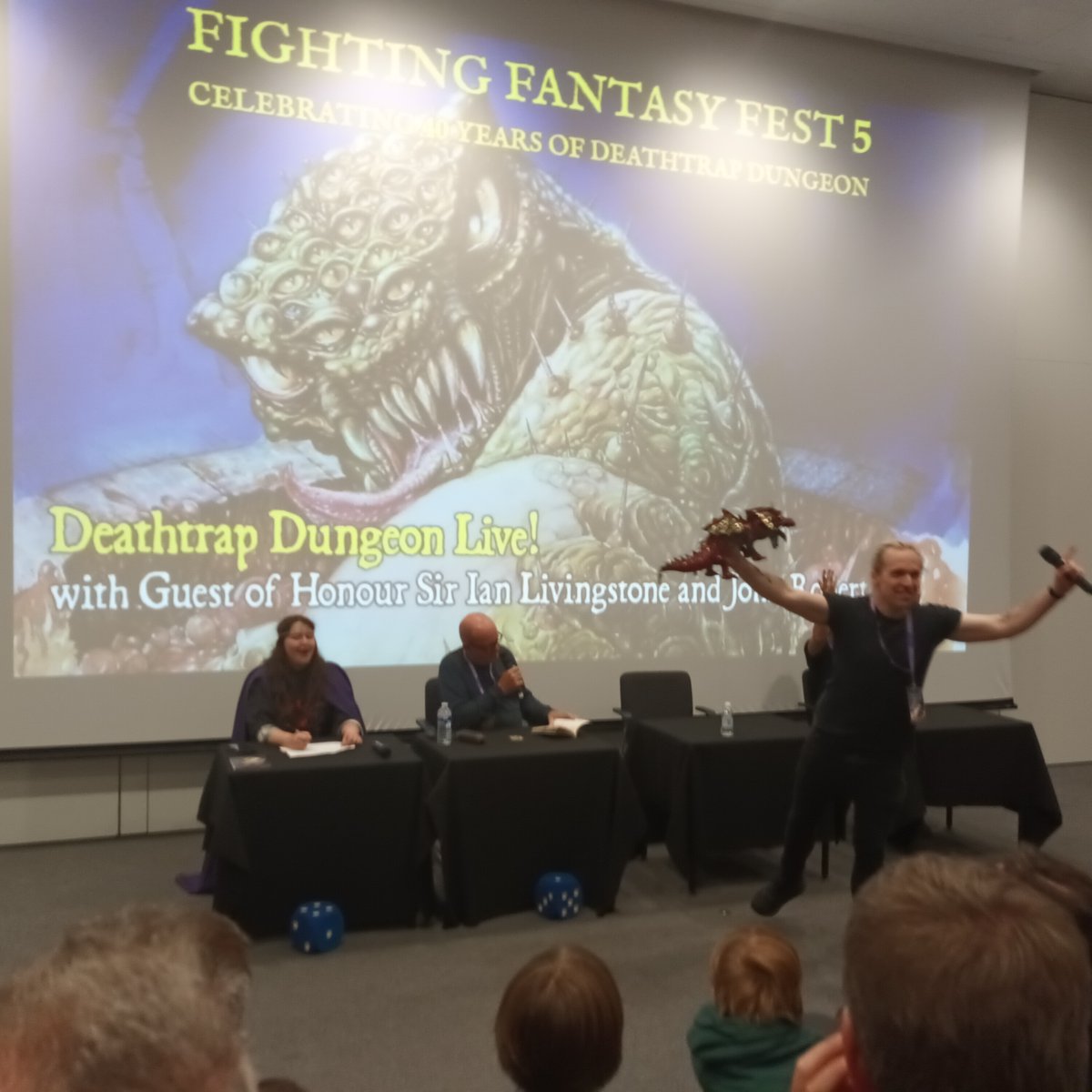 JAMOGRAD's tweet photo. I had a lovely time at #FFFest5. All the stars! All the artists! A glorious tribute to @fightingfantasy and other gamebooks. @ian_livingstone was an absolute star as always. Thanks to @jonathangreen and the team for putting together such an amazing event! https://t.co/Pvz53zLuw3