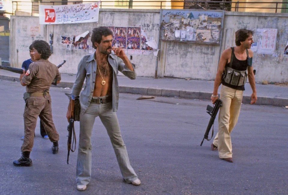 LaocoonofTroy's tweet photo. Armed men in the street during the Lebanese Civil War, 1978. https://t.co/8xMsSGu9or