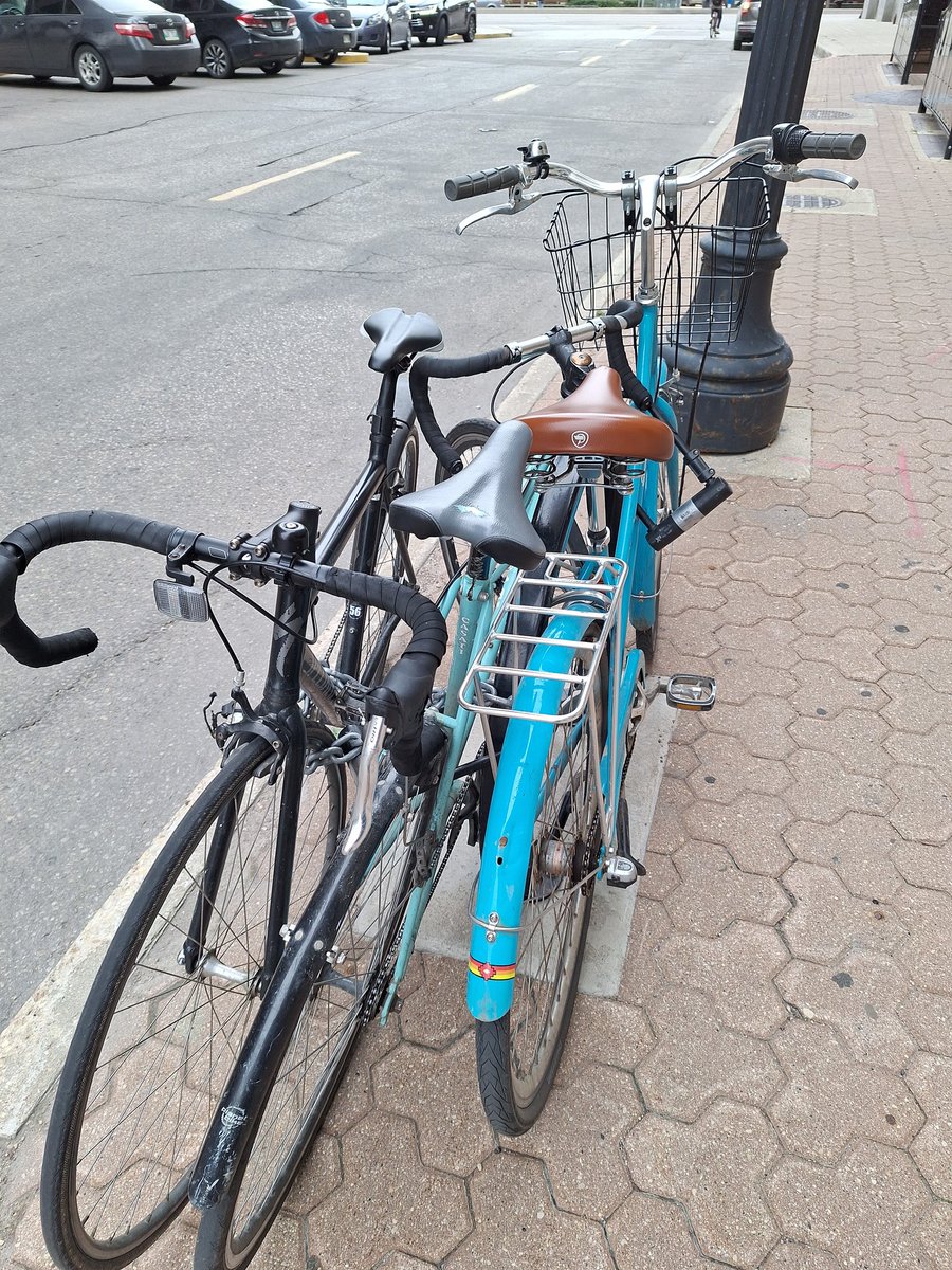 beautifulyangry's tweet photo. Hey @cityofwinnipeg  &amp; Exchange district biz. Probably could use some more bike racks on Lombard. This one is 3 bikes deep. https://t.co/2ALVTkAOWn