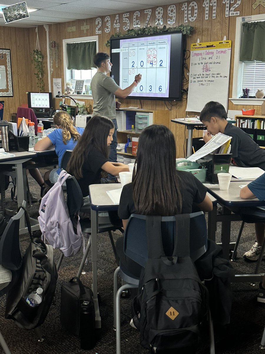 MHuntMISD's tweet photo. Off to the races! 🏇 Mrs. Bowden's 5th grade class @JaneLong_MISD is learning how to compare decimals in style by watching the Kentucky Derby. 🥳 They even had snacks for the race 🎩 #FunLearning #5thGradeMath #KentuckyDerby #MidlandISDmath @Alaina_Boaz https://t.co/em9WsUlJfS
