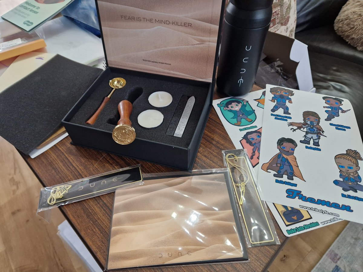 CountThalim's tweet photo. First of my packages from @tribalyfe 

Key amongst them the Atreides seal. I now have plans for another Dune game just so I can hand out waxed sealed letters from the Duke!

The bookmarks are also gorgeous and in danger of being nicked by my eldest. 😱 https://t.co/A3RPjLB34E