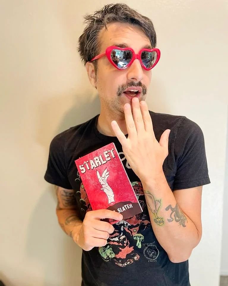 Danger_Slater's tweet image. STARLET is OUT NOW! This is my best book yet. Full of thrills, chills, and body horror weirdness. Get yours today and help me achieve my dream of being the world's first 40-year-old mustachioed ingΓ©nue. Thank you @GhoulishBooks for publishing my nonsense. Next stop: THE OSCARS!