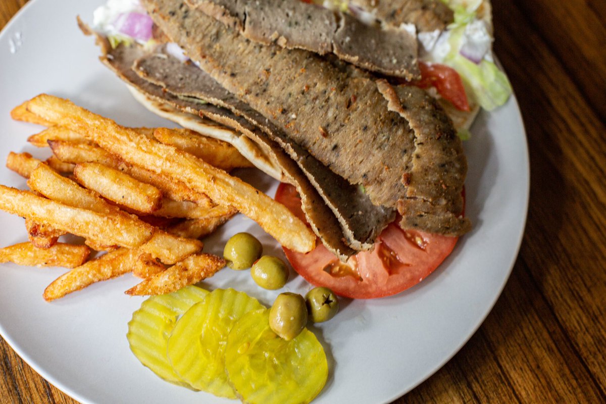 Experience the rich, coastal flavors of the Mediterranean. Every bite of our tender gyro, crispy fries, and fresh sides brings a taste of tradition to your plate. #oliveburger #eatoliveburger #burger #gyro #fries #halalfood #mediterraneanfood #döner #kabab #greekfood