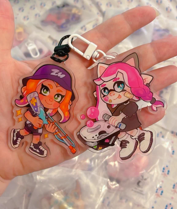 I made matching keychains of my sister's  Splatoon character and mine 