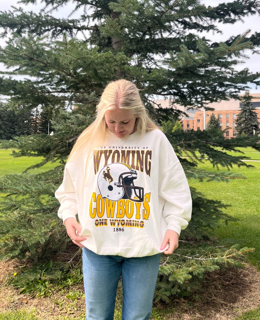 Who's ready to be back in War Memorial, watching <a href="/wyo_football/">Wyoming Cowboy Football</a> ? 
🙋🙋🙋
Check out this comfy crewneck online and in-store!