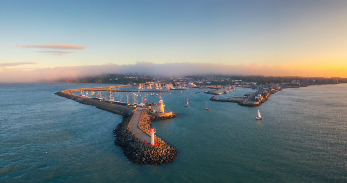 Howth Harbour with fog over the hills this evening.