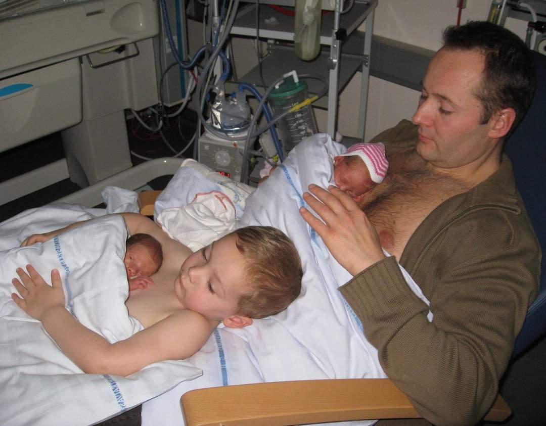 This thread will brighten up your day.

1. A big brother helping his father give skin to skin contact to his premature twin siblings