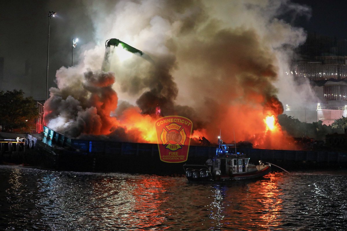 ctfirephoto's tweet photo. UPDATE FROM QUEENS BARGE FIRE: CFPA New York City Member Chris Clarke @FirstDuePhotog reports 1 tower ladder and several marine units continue to operate the extended operation. At this time, the bulk of the fire has been knocked down. #fdny #bargefire https://t.co/oPs0U5oM3M