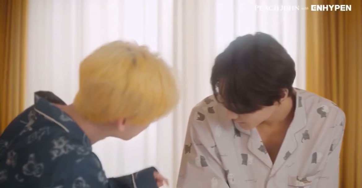 pocketzgallery's tweet photo. sunoo and jungwon patting the cat design on jungwon's pjs they're so cute 🥹 https://t.co/yQoFDmHxEm