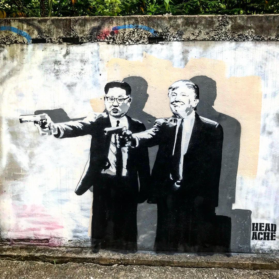 Reaproy's tweet image. Some great graffiti seen in Bangkok - Donald Trump and his North Korean love letter interest, reprising Pulp Fiction...

#DefeatTrump #Kamala4President2024