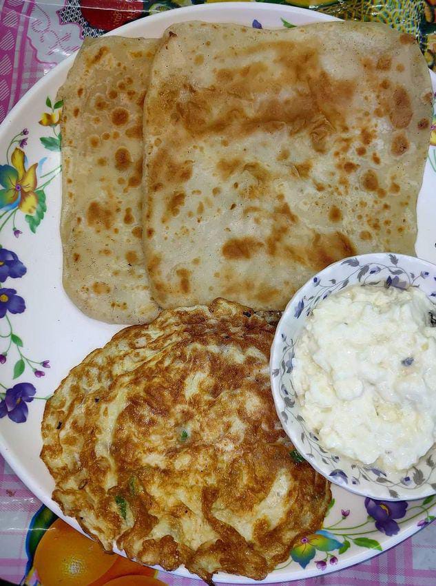 Chose only one..?

Pori choly         or       anda paratha