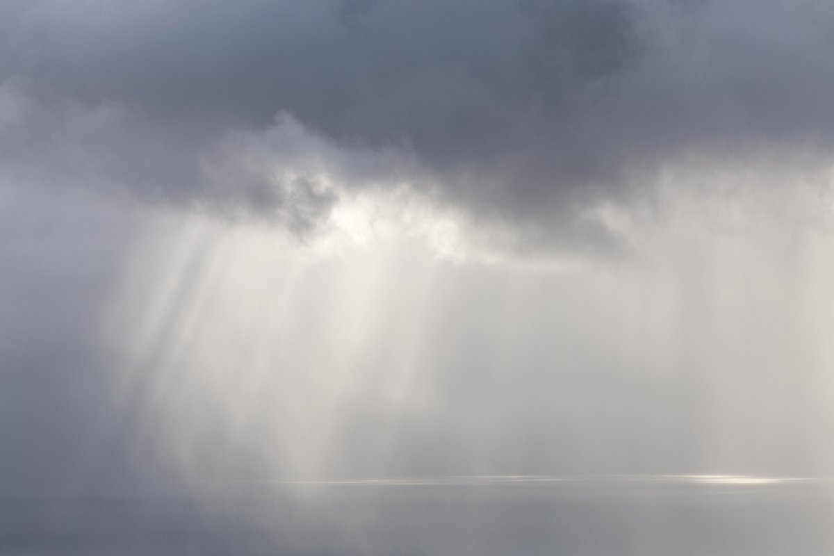 Captured a few mornings ago from the Quiraing looking towards the mainland. I loved the look of these crepuscular rays which picked out the passing rain shower.