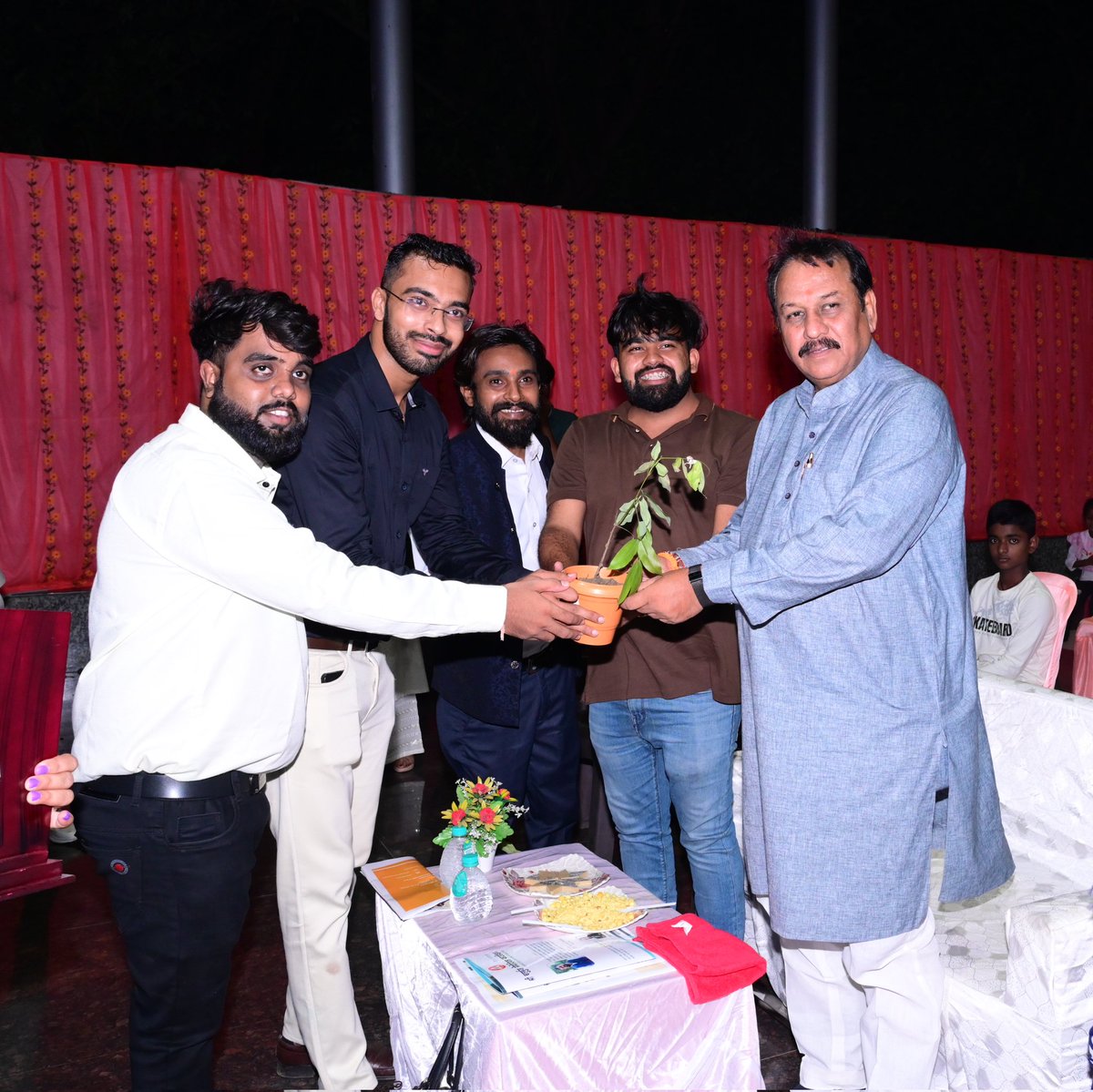Starlightfo_'s tweet photo. "Excited to welcome our esteemed guests with open arms and a token of love—a beautiful plant to brighten their day and their home. With the beaming light of adoration we welcomed our Chief Guest of the eve @vijaybaghelcg (Honorable MP - Durg). https://t.co/5tGoLxTd3n