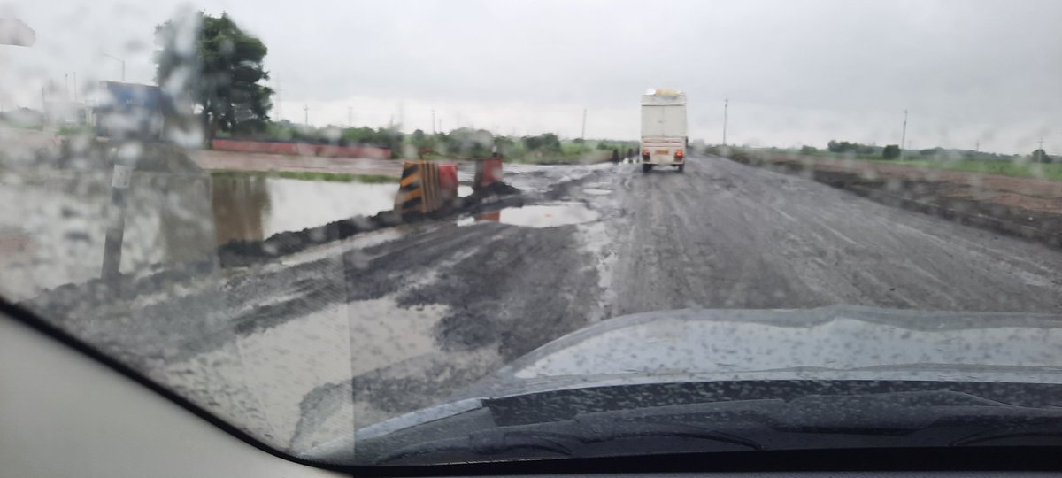 dhwanins's tweet photo. Due to Machhu Dam water being released, the Morbi route from Kutch is closed. We were forced to take the NH27 route from Gandhidham to Radhanpur-Palanpur. The entire road is full of pot holes and still we paid @NHAI_Official toll for risking our lives to reach our destination. https://t.co/24jbVWXSKi