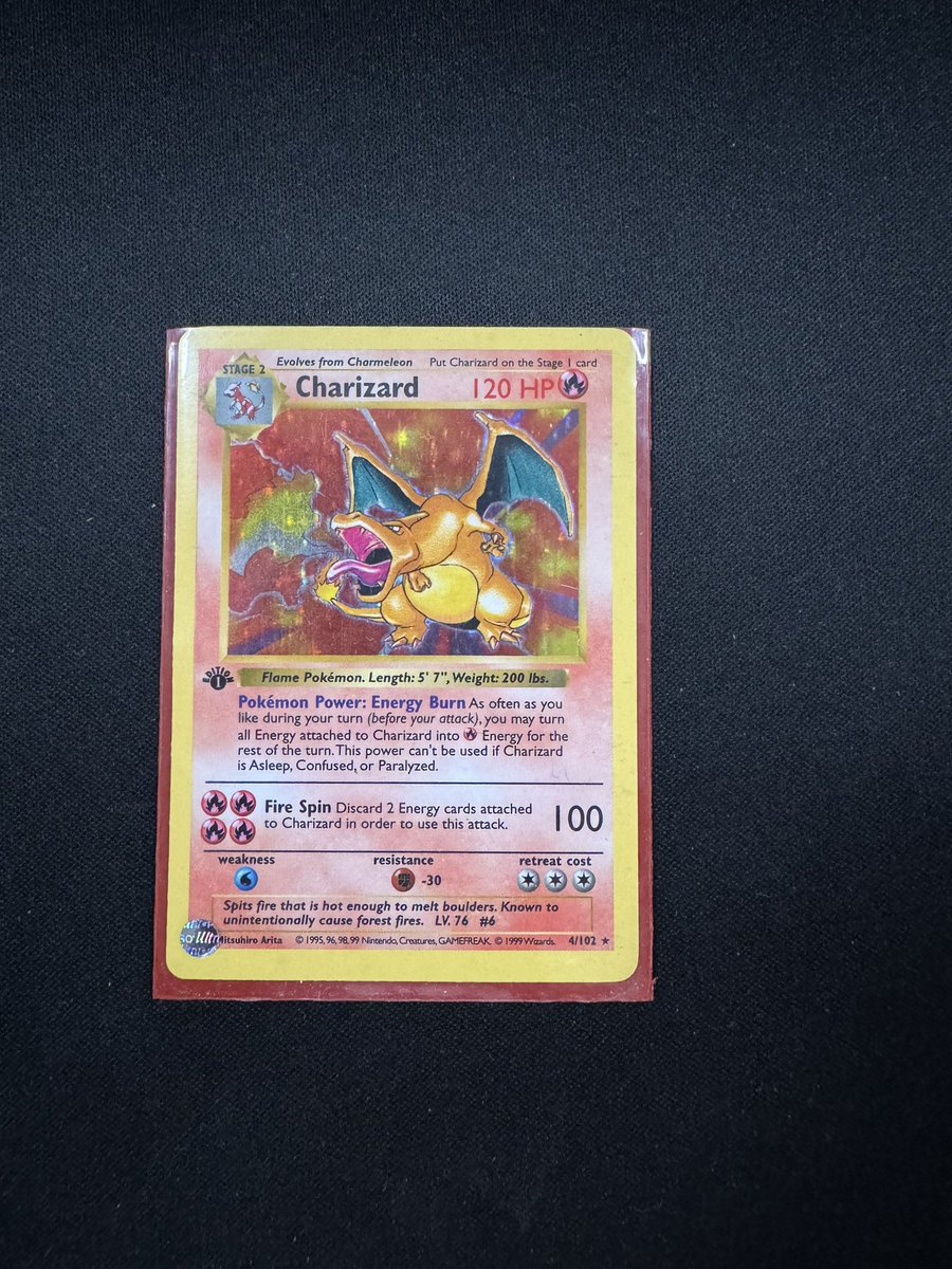 Xzero's tweet image. Rummaged an old box of memories and found a relic from 1999.  Original Base Set 1st Edition Charizard.  Found these old gold plated collectibles to.